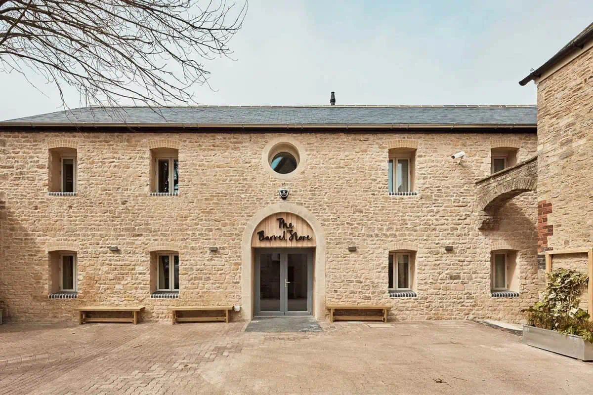 Beautiful brick facade of a contemporary house with rustic detailing and modern entrance, perfect for stylish interior and outdoor decor.